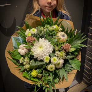 Julebuket i lyse farver